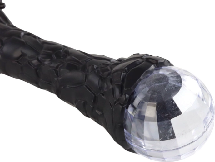 Helendav kuul käepideme otsas